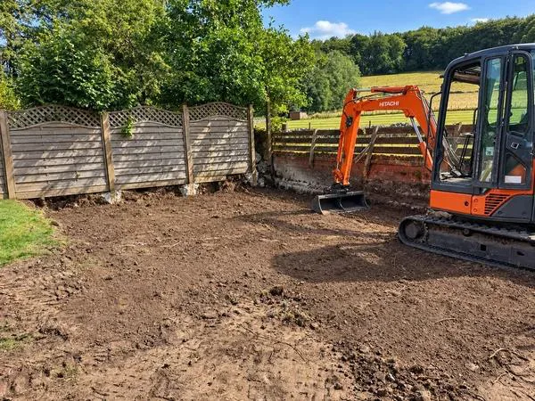 Site clearance with mini excavator